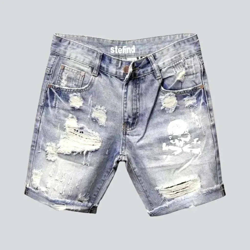 Skull print ripped denim shorts